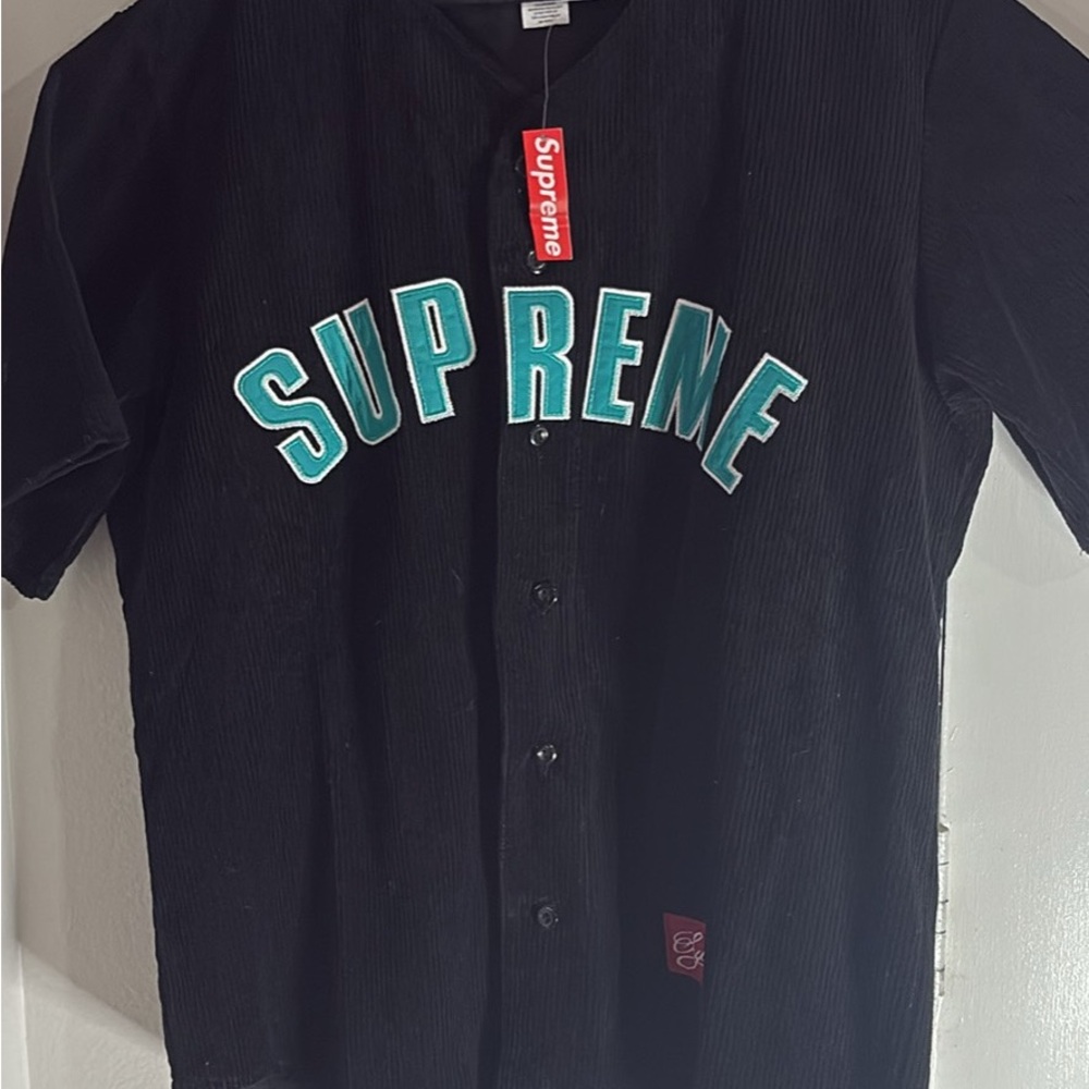 Supreme Black Shirt with Teal Lettering
